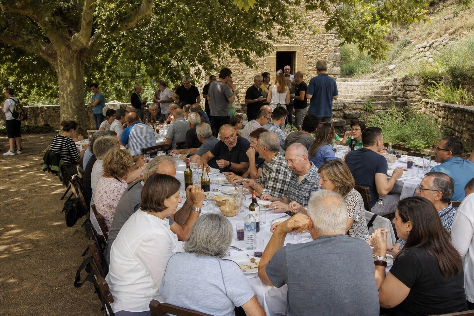 Long outdoor table at a community Catalan breakfast