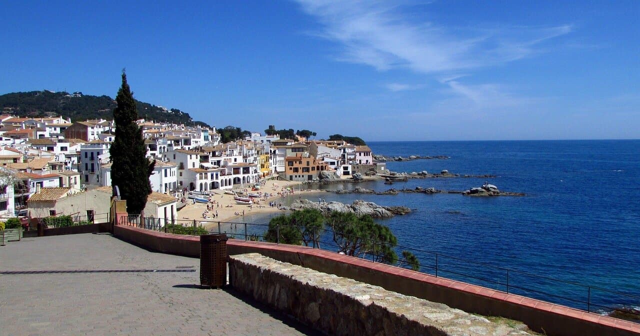 Calella de Palafrugell’s waterfront houses and small bays in daylight