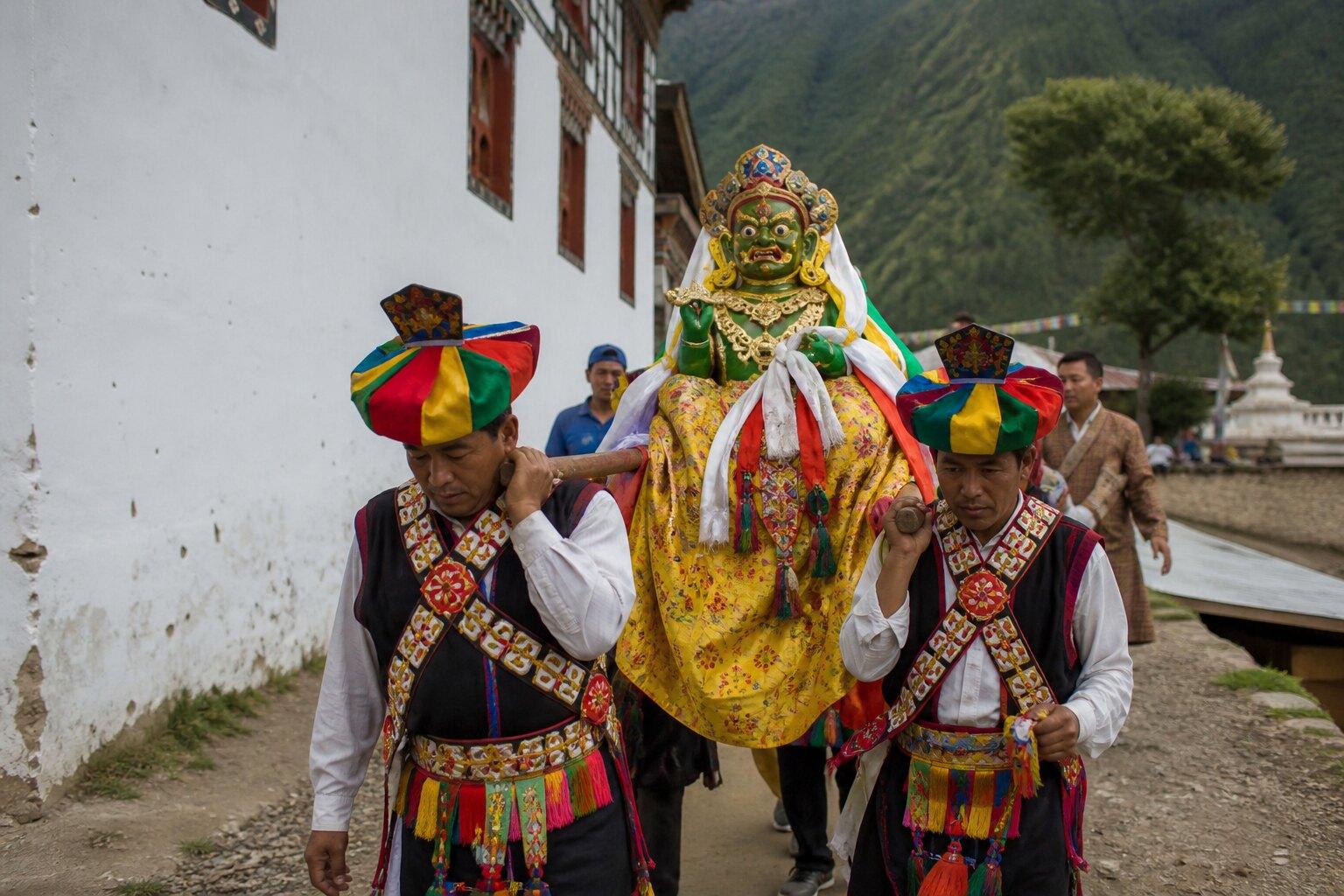 Patum performers carrying a traditional guita figure